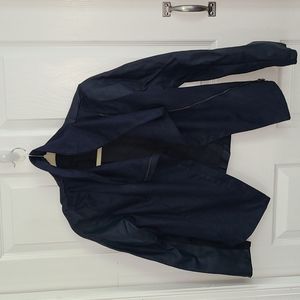 Moto jacket, faux leather and suede.